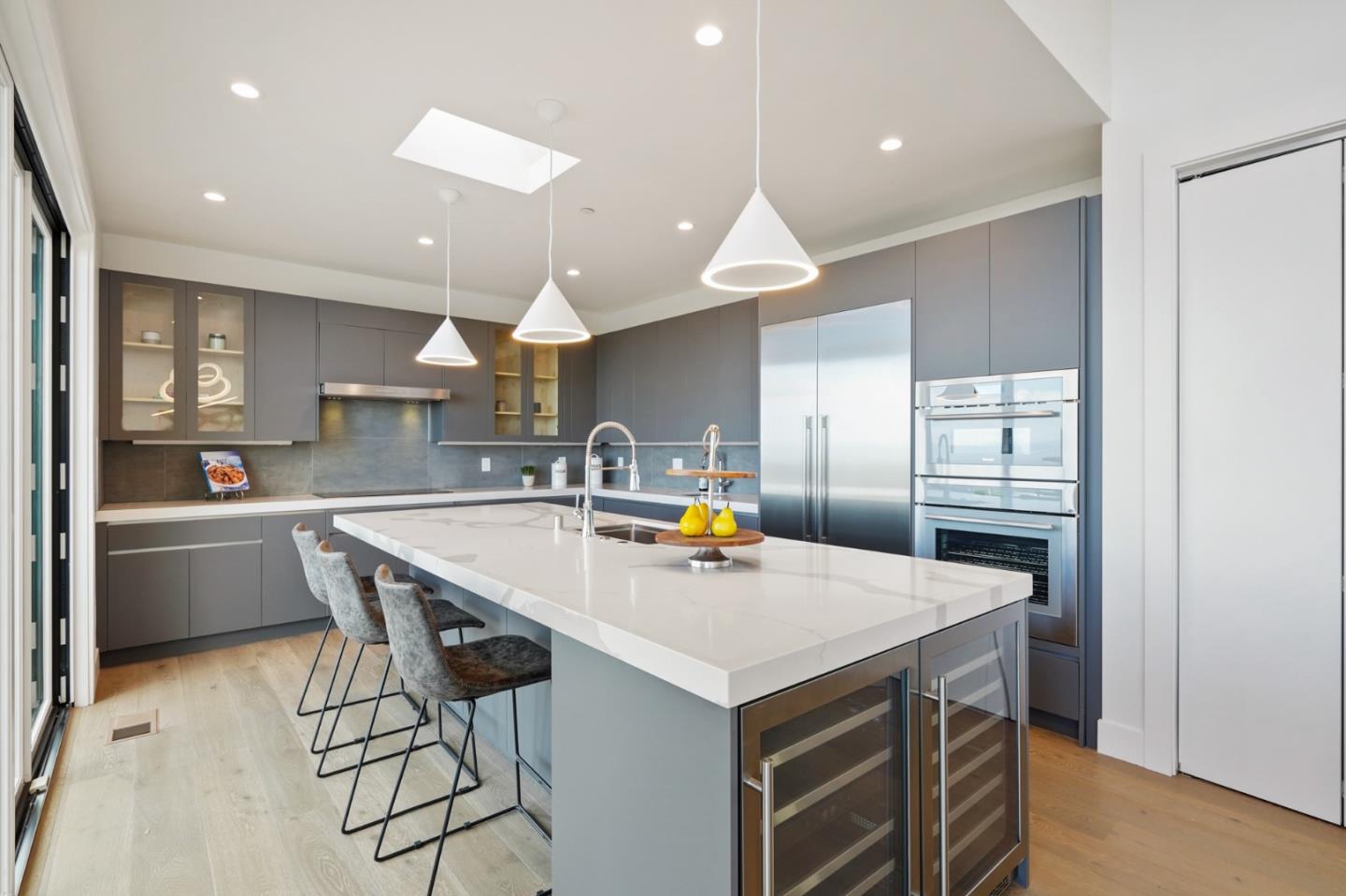 470 Erlin Drive San Carlos, CA 94070 - Photo 19 of 82 a kitchen with a table chairs microwave and cabinets