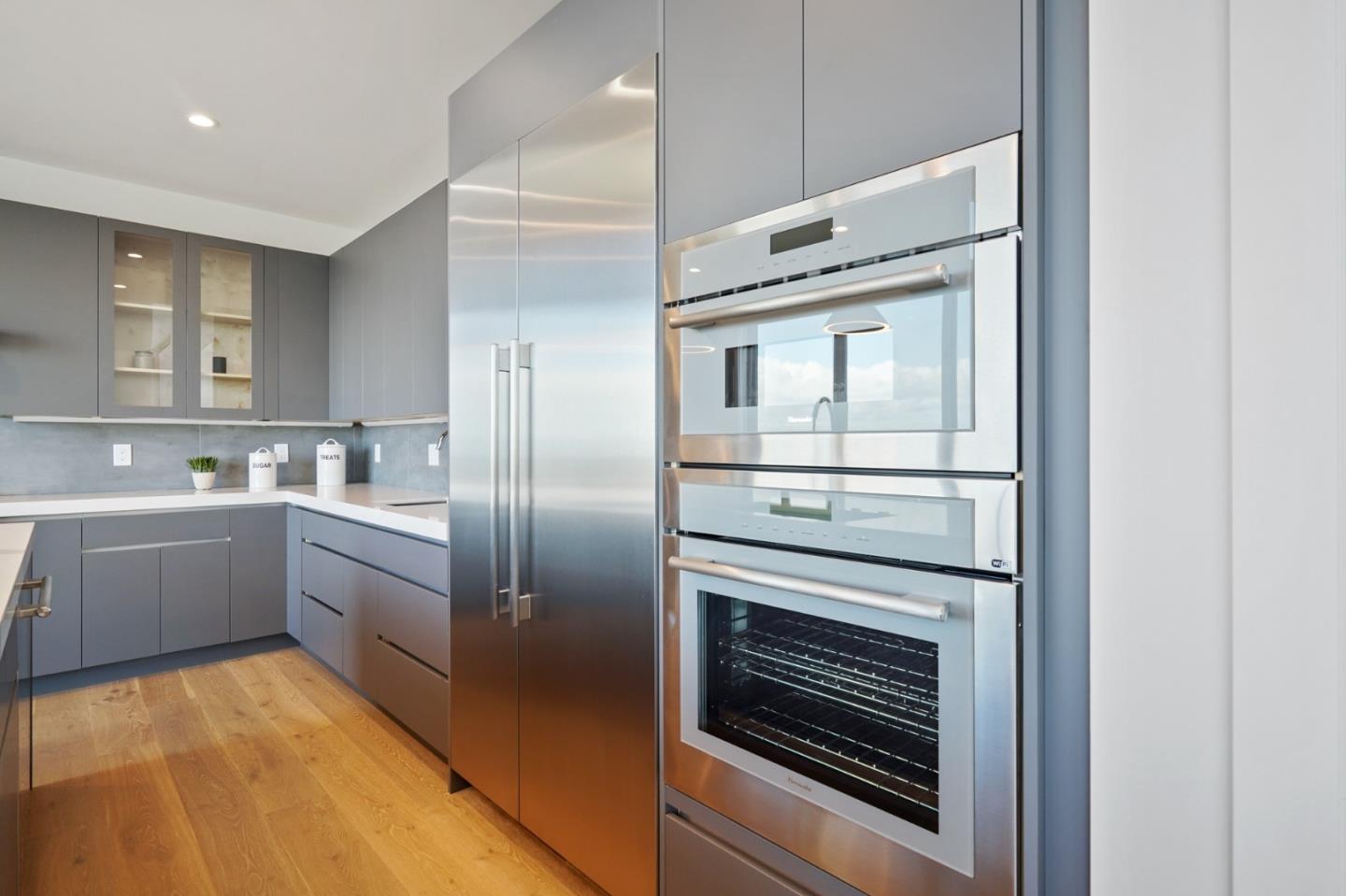 470 Erlin Drive San Carlos, CA 94070 - Photo 21 of 82 a kitchen with a refrigerator sink and cabinets