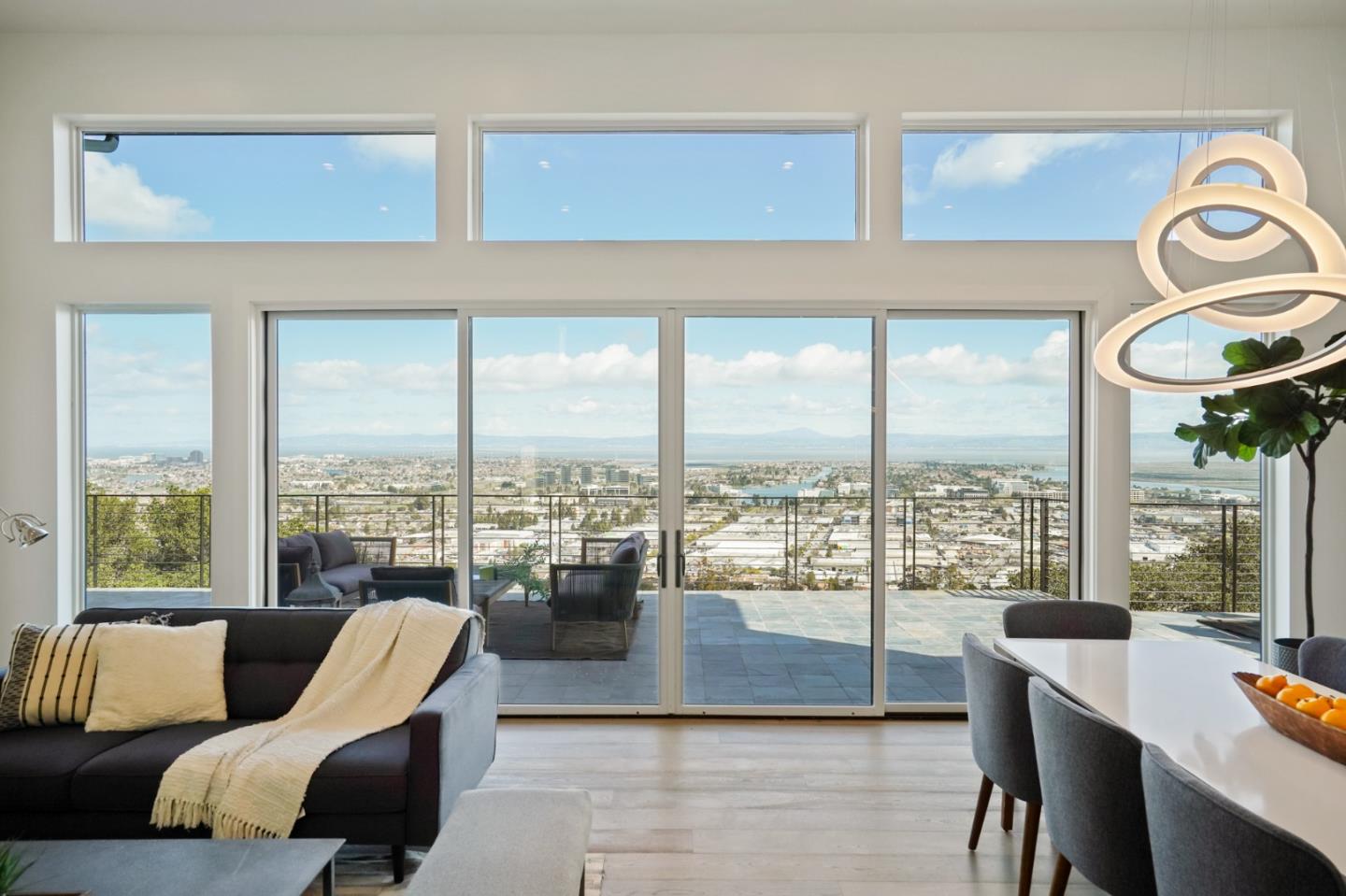 470 Erlin Drive San Carlos, CA 94070 - Photo 23 of 82 a living room with furniture and a floor to ceiling window