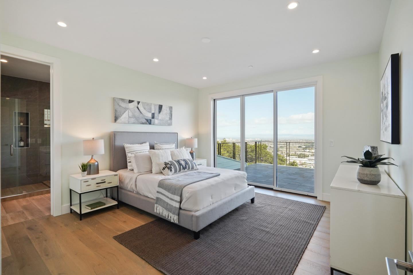 470 Erlin Drive San Carlos, CA 94070 - Photo 24 of 82 a spacious bedroom with a bed and a large window