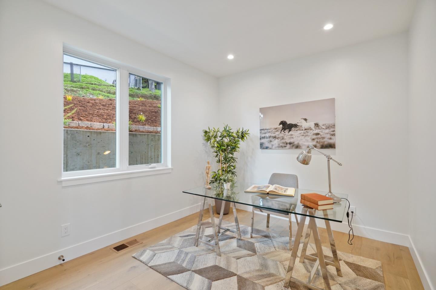 470 Erlin Drive San Carlos, CA 94070 - Photo 35 of 82 a view of a dining room with furniture and a potted plant