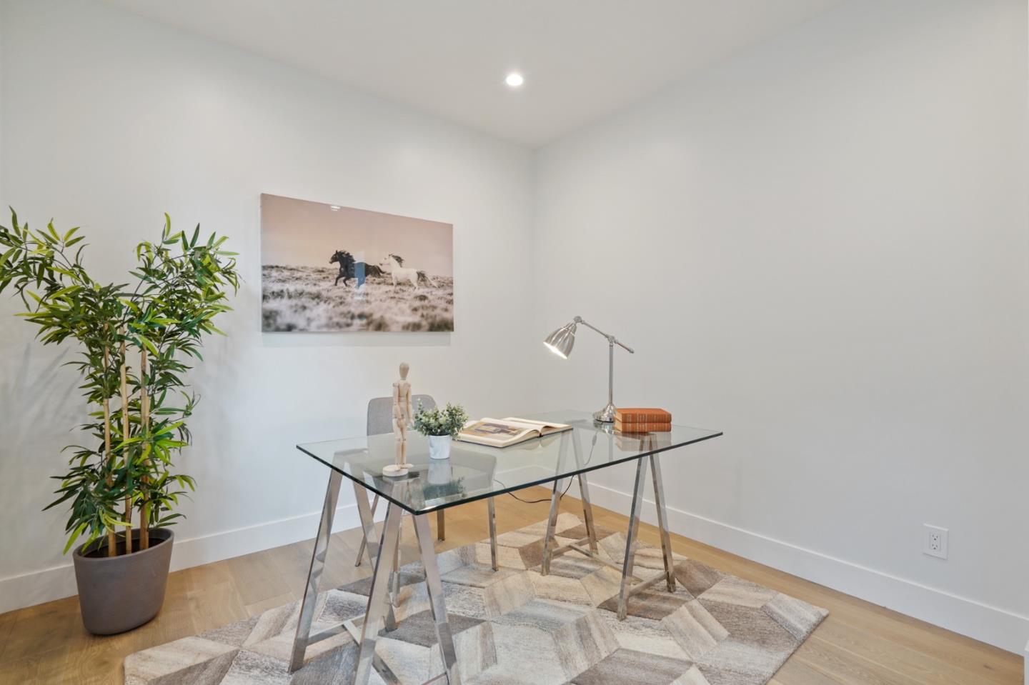 470 Erlin Drive San Carlos, CA 94070 - Photo 36 of 82 a table with a vase and flowers on it