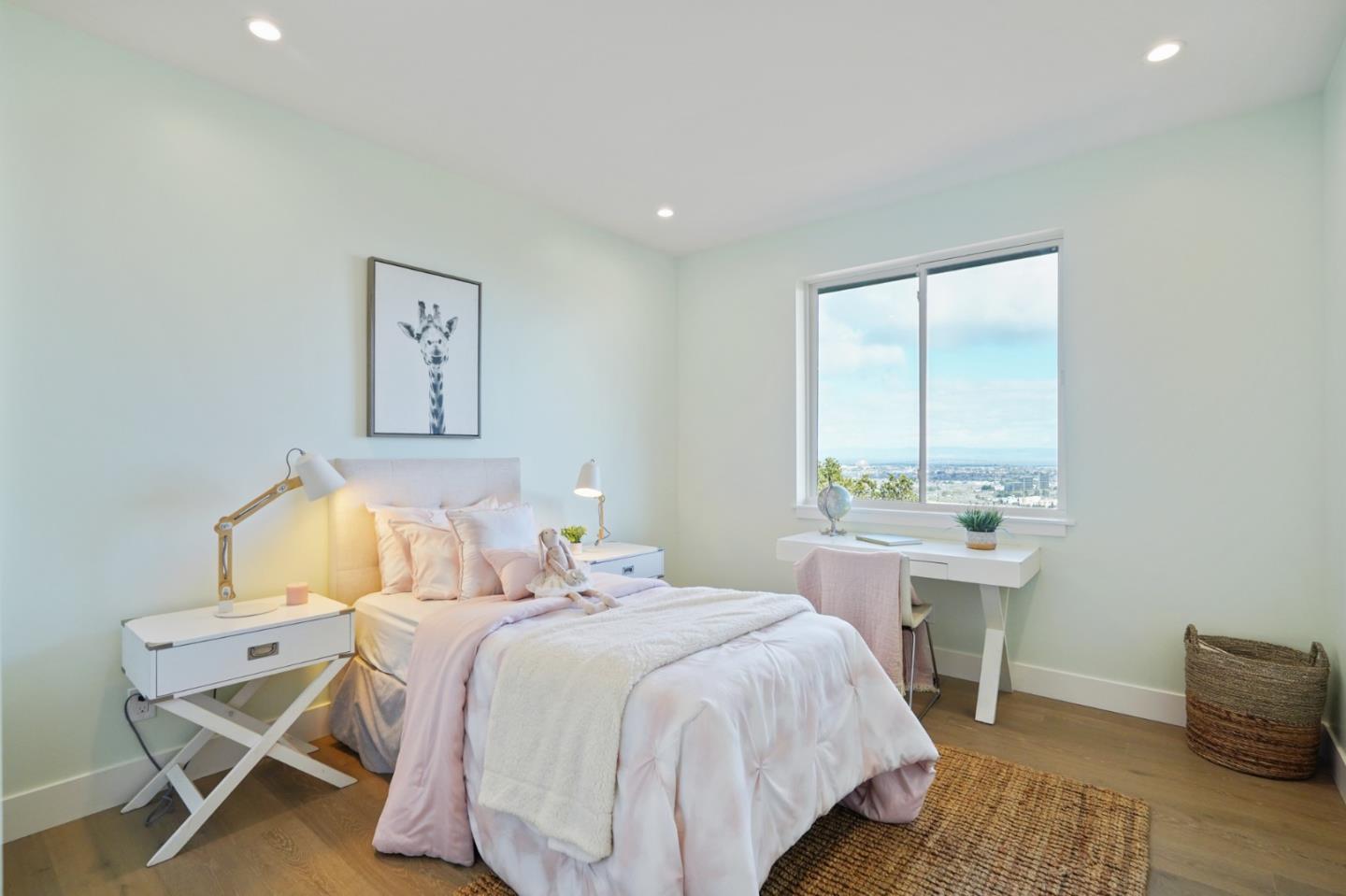 470 Erlin Drive San Carlos, CA 94070 - Photo 49 of 82 a bedroom with a bed and a table in it