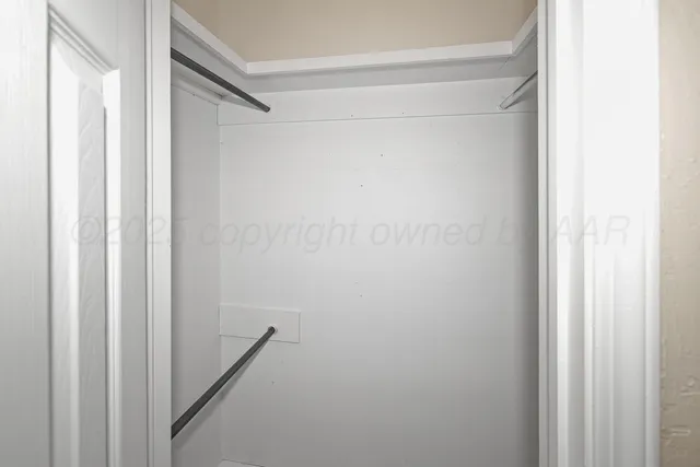 a view of a room with a fan