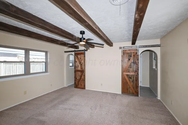 a view of a room with a window