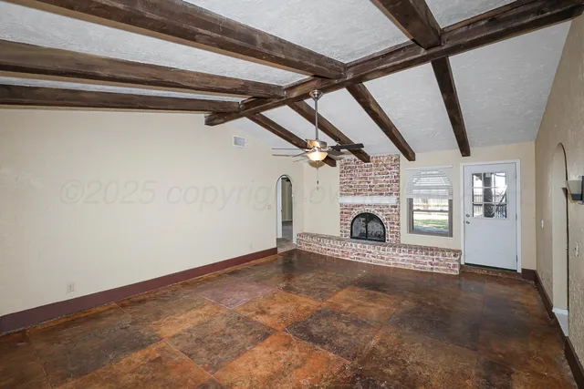 a view of a livingroom with a car