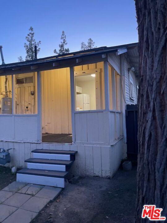 1608 E Street Bakersfield, CA 93301 - Photo 32 of 34 a bathroom with a sink and a mirror