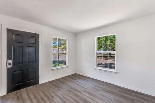 an empty room with windows