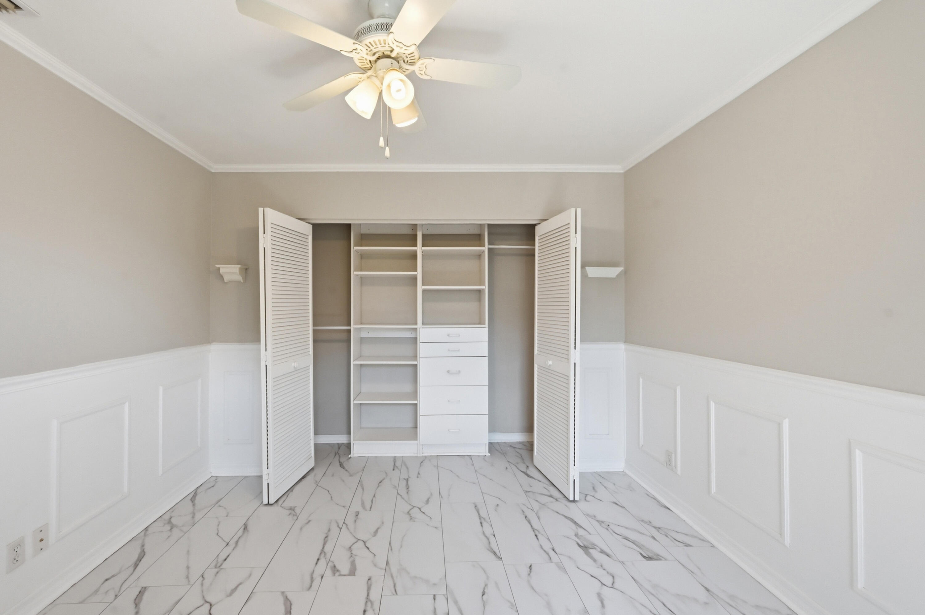 9364 Ketay Circle, Unit 5 Boca Raton, FL 33428 - Photo 23 of 42 wooden floor in an empty room