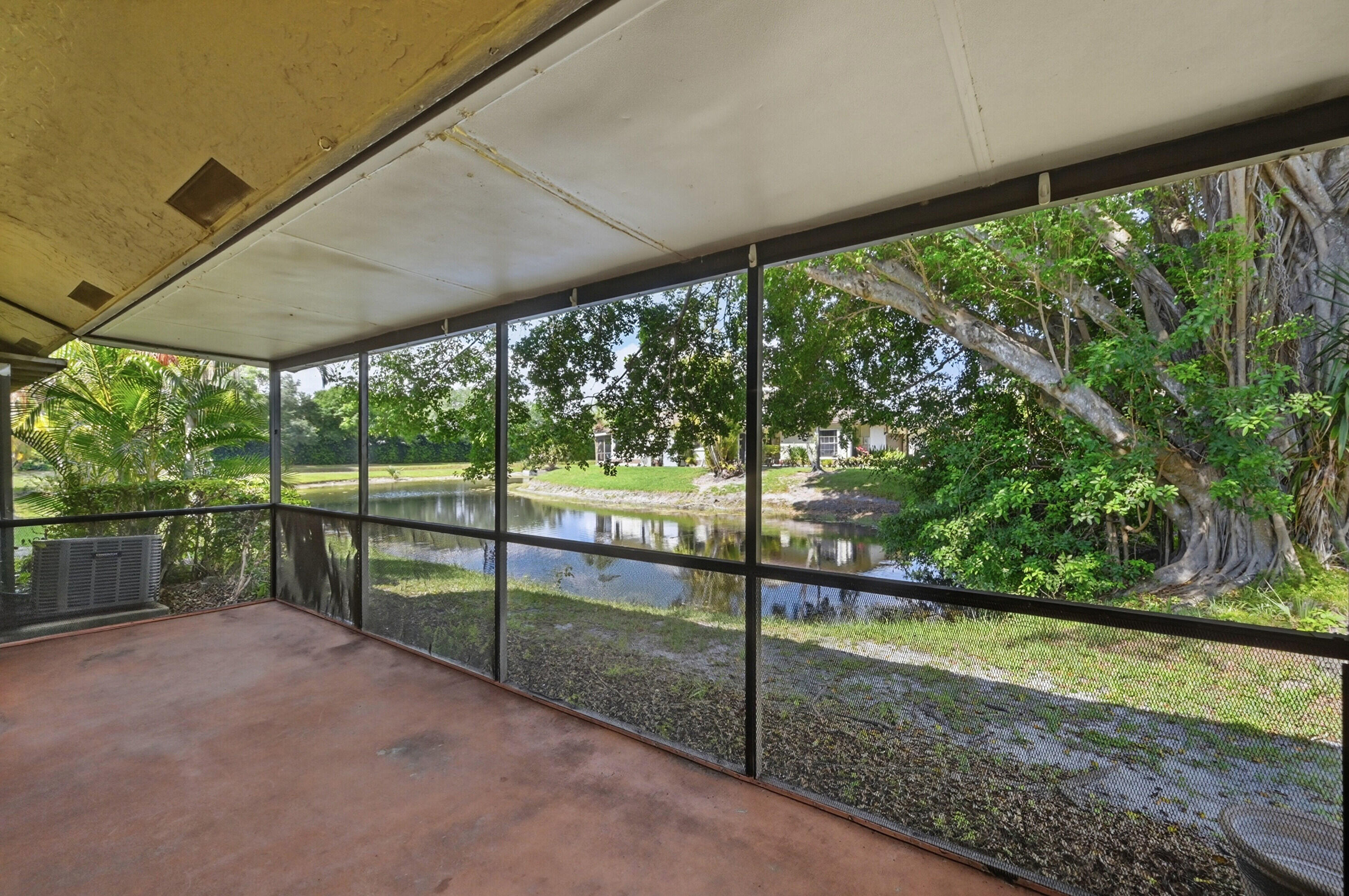 9364 Ketay Circle, Unit 5 Boca Raton, FL 33428 - Photo 28 of 42 a view of outdoor space with deck