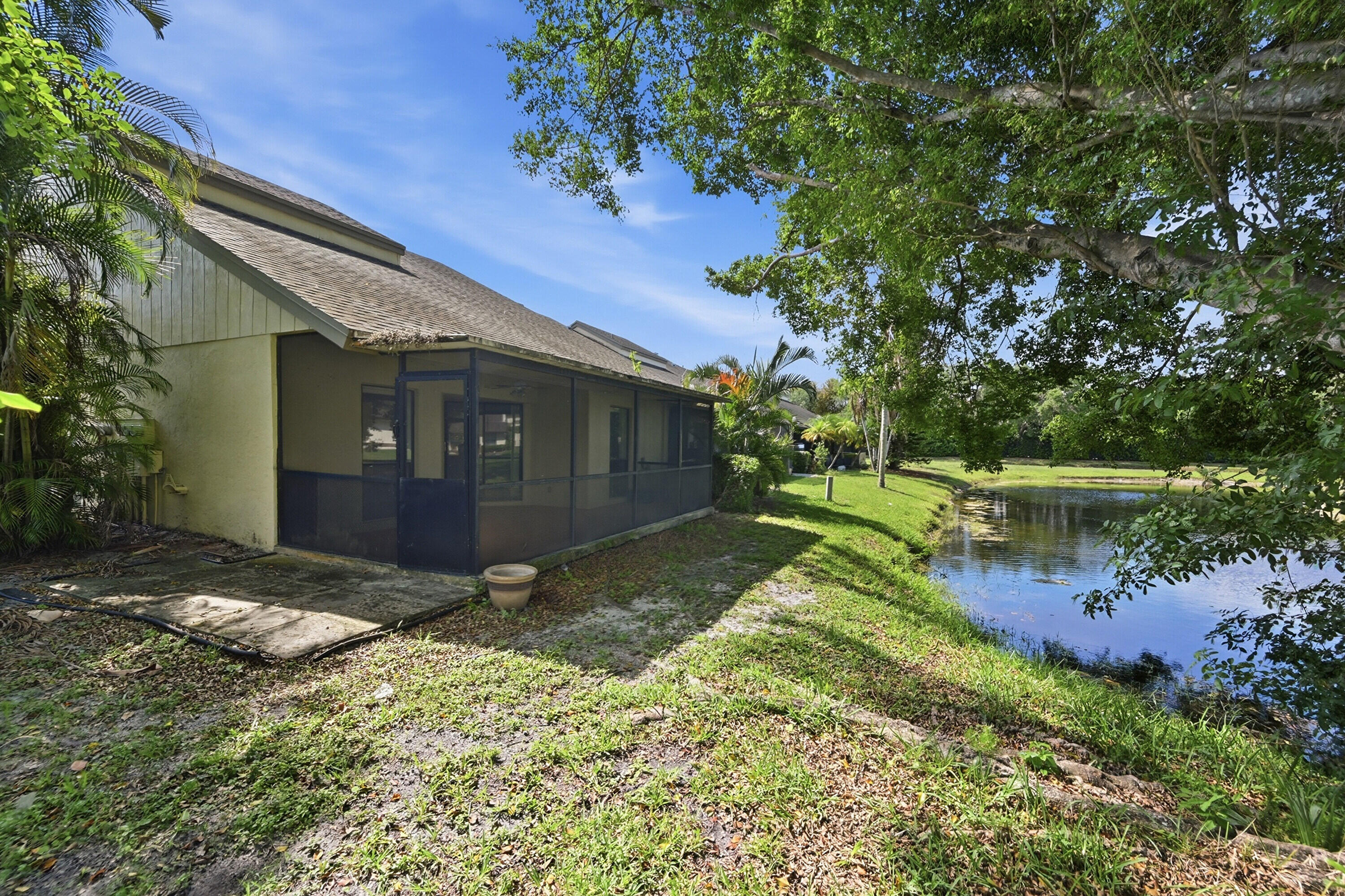 9364 Ketay Circle, Unit 5 Boca Raton, FL 33428 - Photo 32 of 42 a view of a back yard of the house