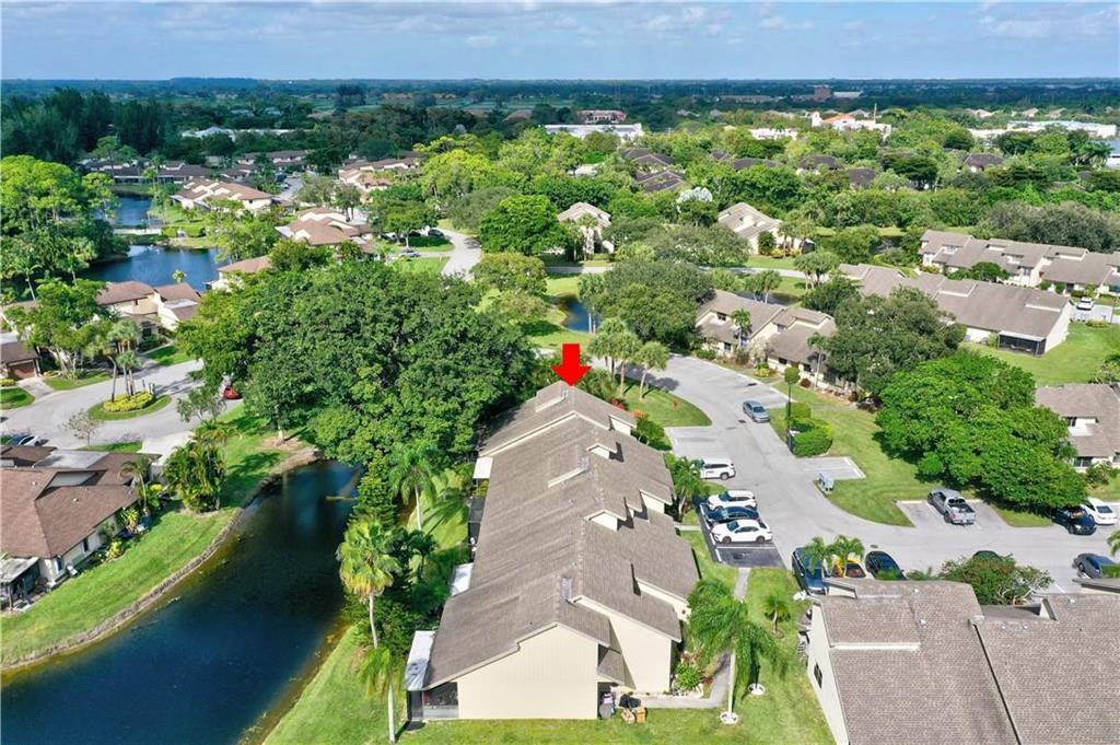 9364 Ketay Circle, Unit 5 Boca Raton, FL 33428 - Photo 39 of 42 an aerial view of a house and a yard
