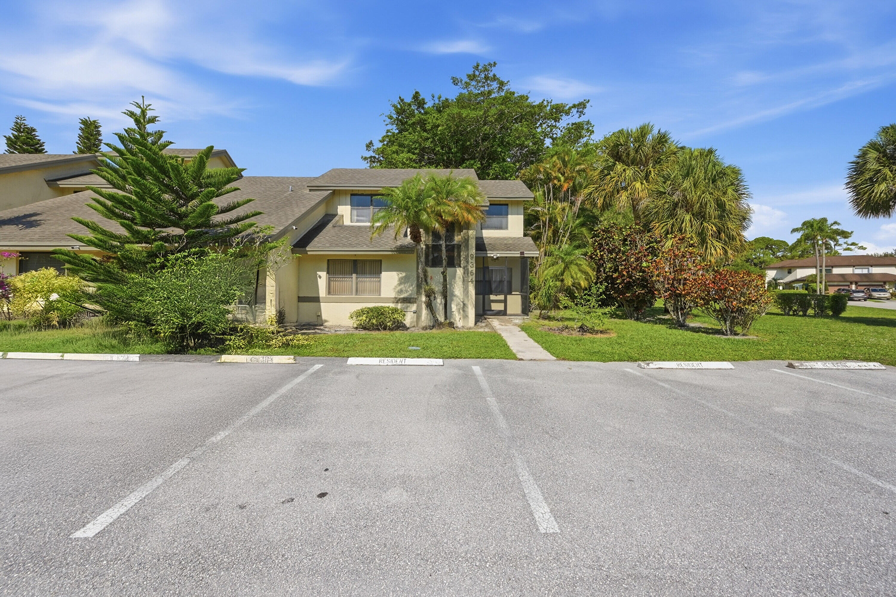 9364 Ketay Circle, Unit 5 Boca Raton, FL 33428 - Photo 42 of 42 a view of a house with palm trees