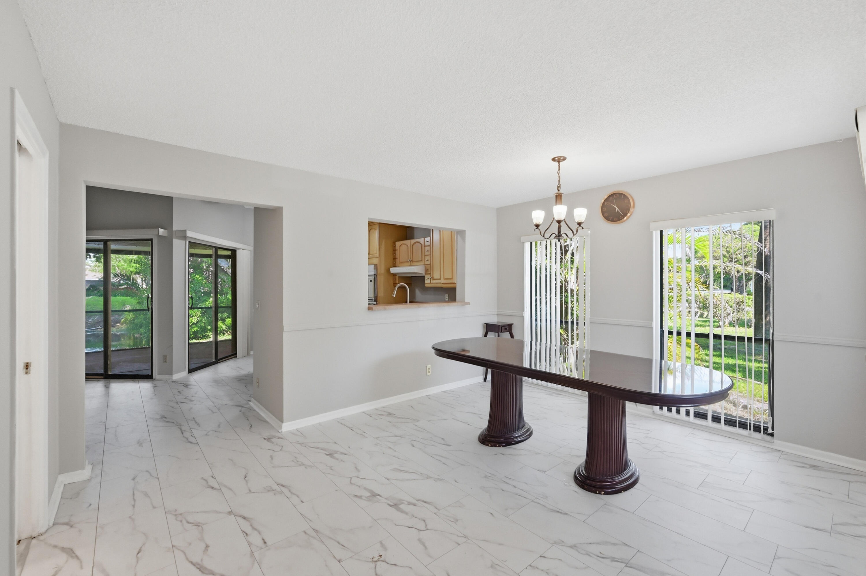 9364 Ketay Circle, Unit 5 Boca Raton, FL 33428 - Photo 5 of 42 a view of a livingroom with a furniture and window