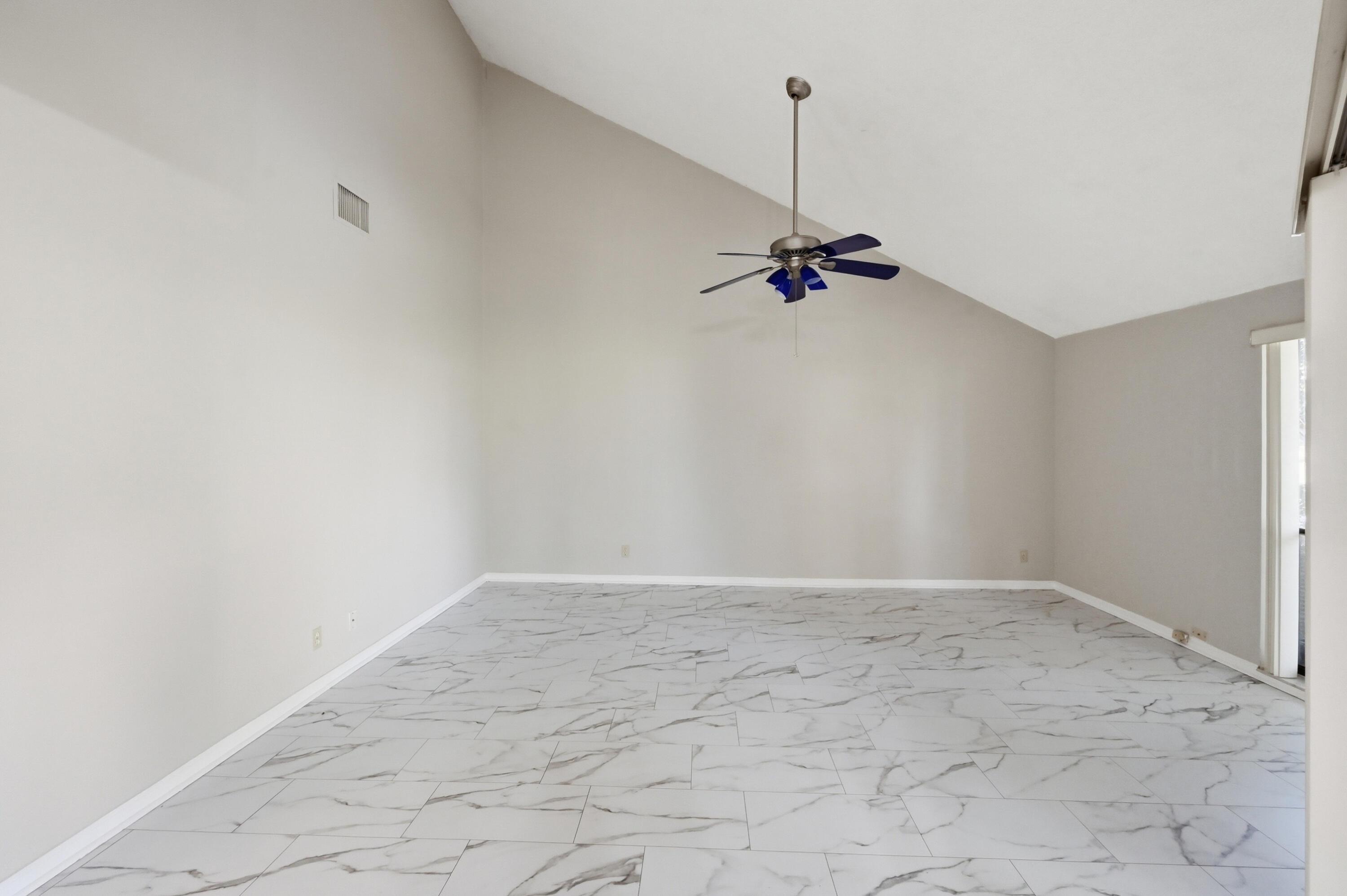 9364 Ketay Circle, Unit 5 Boca Raton, FL 33428 - Photo 10 of 42 a view of a room with a ceiling fan