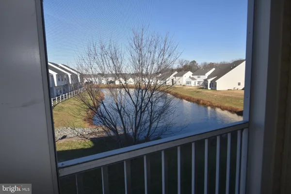 a view of a forest from a balcony