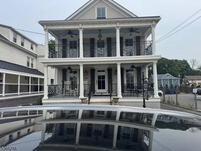 a front view of a house with a porch