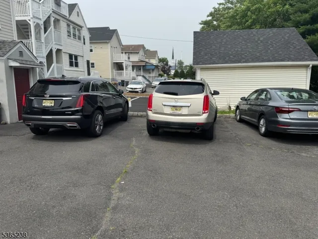 a car parked in front of a house