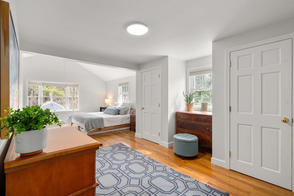 10 Wright Road Sudbury, MA 01776 - Photo 11 of 27 a living room with furniture and a rug