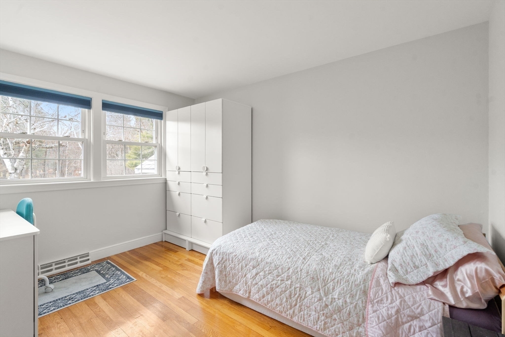 10 Wright Road Sudbury, MA 01776 - Photo 14 of 27 a bedroom with a bed and a window