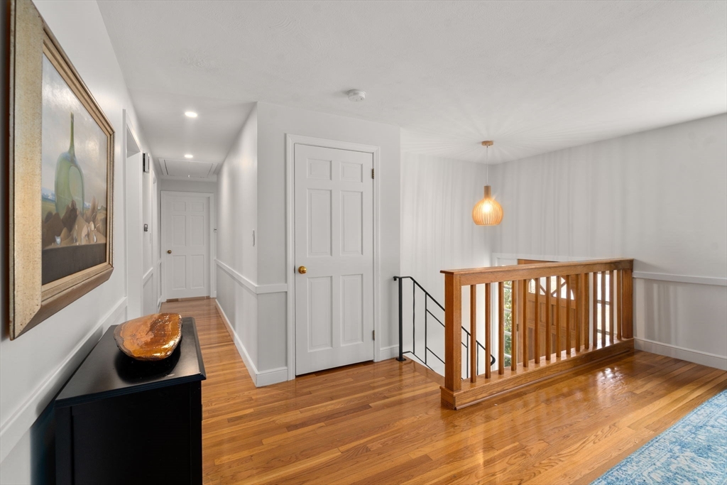 10 Wright Road Sudbury, MA 01776 - Photo 16 of 27 a view of livingroom with furniture and wooden floor