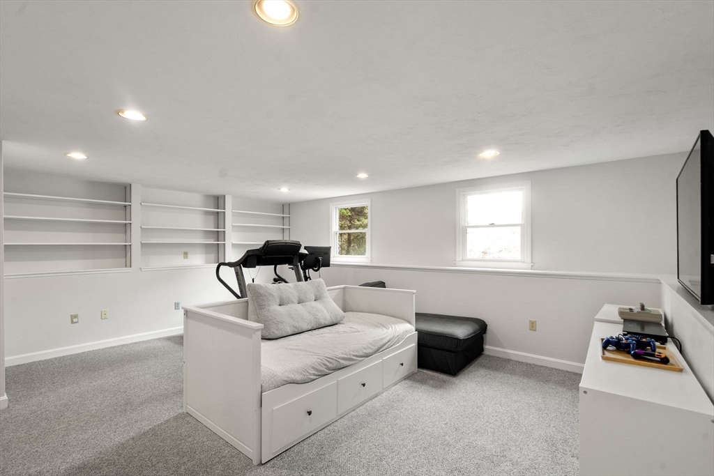 10 Wright Road Sudbury, MA 01776 - Photo 17 of 27 a living room with furniture and a window