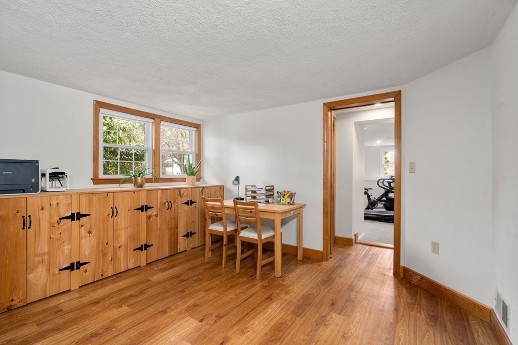 10 Wright Road Sudbury, MA 01776 - Photo 19 of 27 a view of a dining room with furniture window and wooden floor