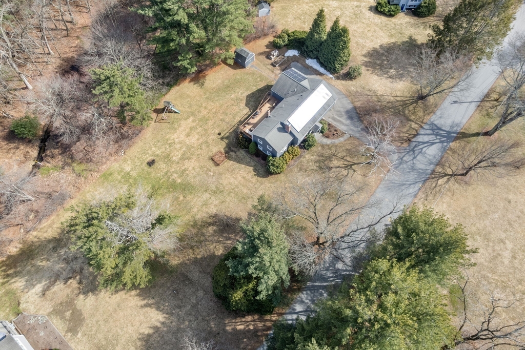 10 Wright Road Sudbury, MA 01776 - Photo 24 of 27 an aerial view of a house with a yard