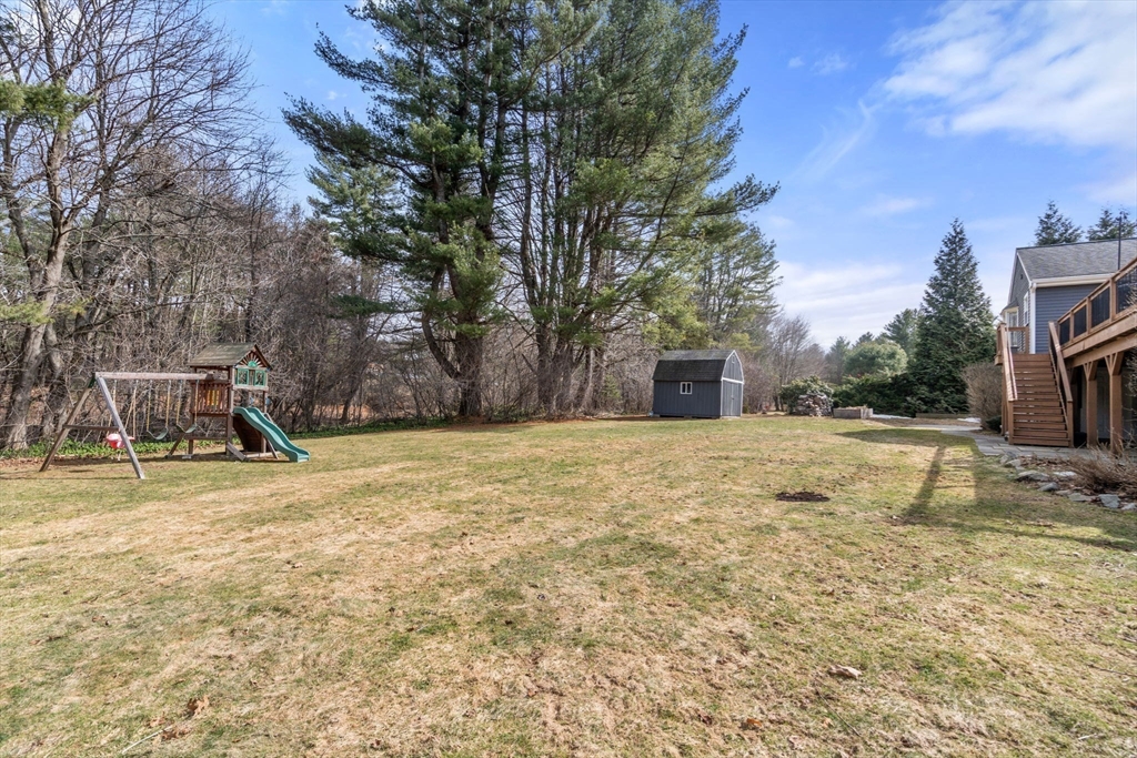 10 Wright Road Sudbury, MA 01776 - Photo 25 of 27 a view of a yard with a house