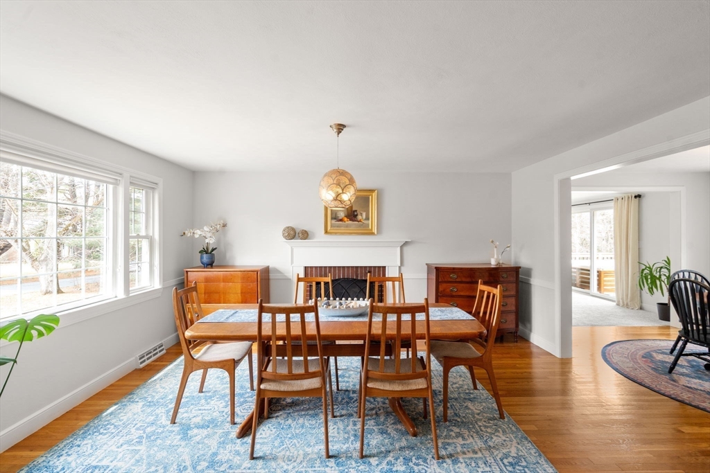 10 Wright Road Sudbury, MA 01776 - Photo 8 of 27 a dining room with furniture and wooden floor