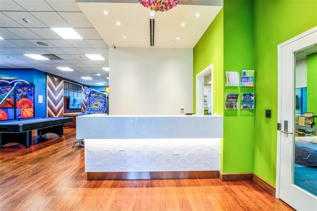 8048 Laurel Ridge Court Delray Beach, FL 33446 - Photo 75 of 103 KIDS CENTRAL FRONT DESK AREA