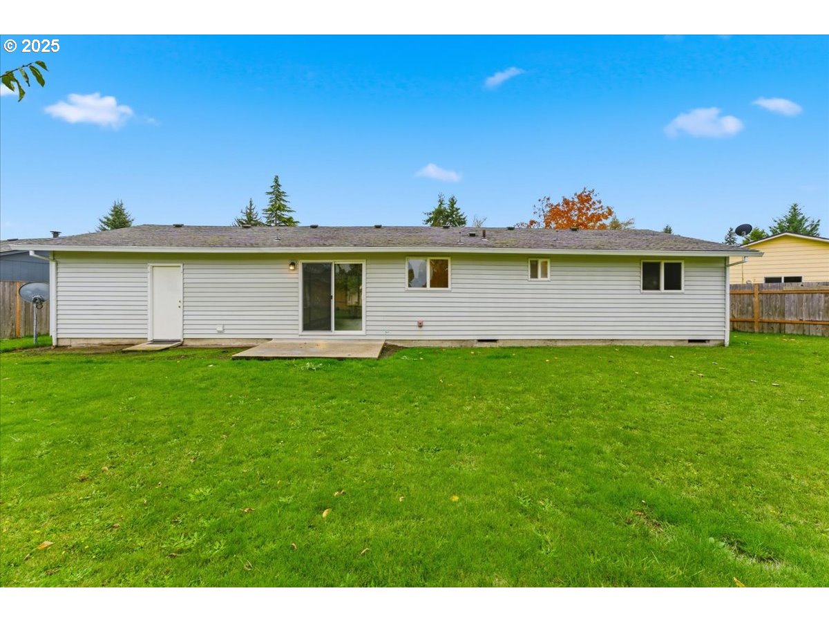 20385 Southwest Shelley Court Beaverton, OR 97078 - Photo 16 of 21 a view of a house with a backyard