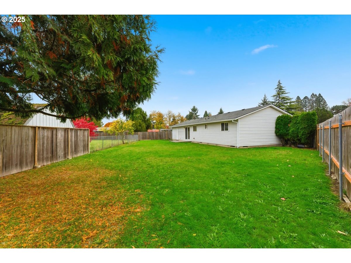 20385 Southwest Shelley Court Beaverton, OR 97078 - Photo 18 of 21 a view of a house with a backyard