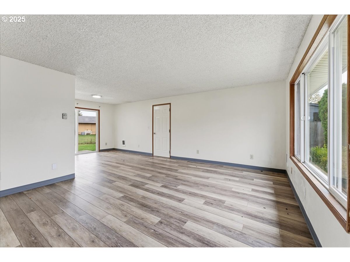 20385 Southwest Shelley Court Beaverton, OR 97078 - Photo 2 of 21 a view of an empty room and window