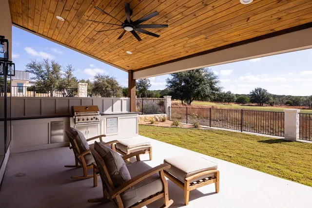 a view of a swimming pool with a patio