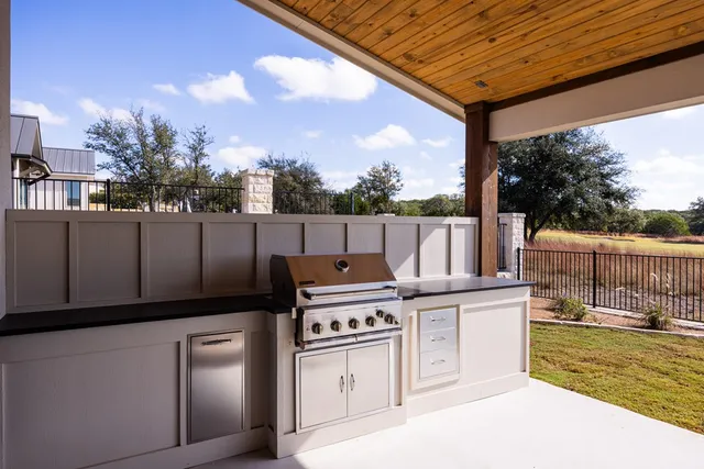 a view of a kitchen from a balcony
