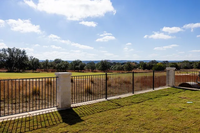 a balcony with a yard