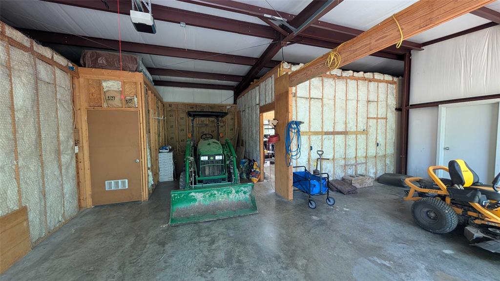 7451 County Road 1509 Athens, TX 75751 - Photo 32 of 36 a view of an empty room with windows