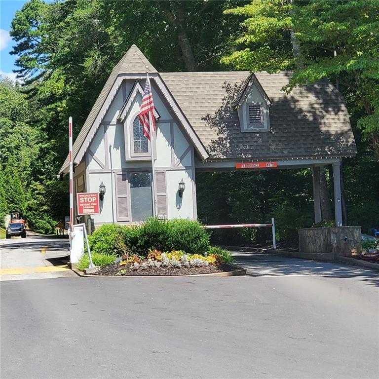 0 Rosen Strasse Helen, GA 30545 - Photo 6 of 6 a view of a house with a yard and large tree