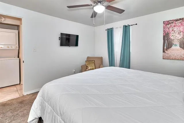 a view of a room that has a washer and dryer