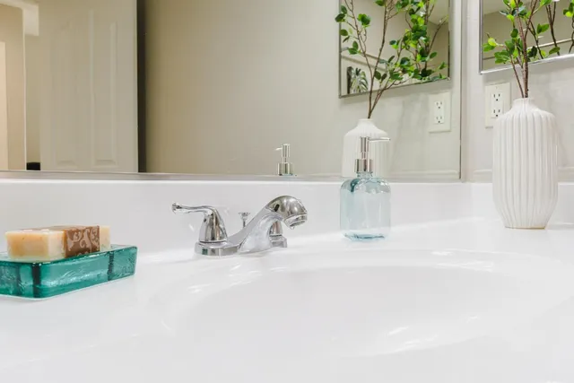a vase of flowers sitting on a table