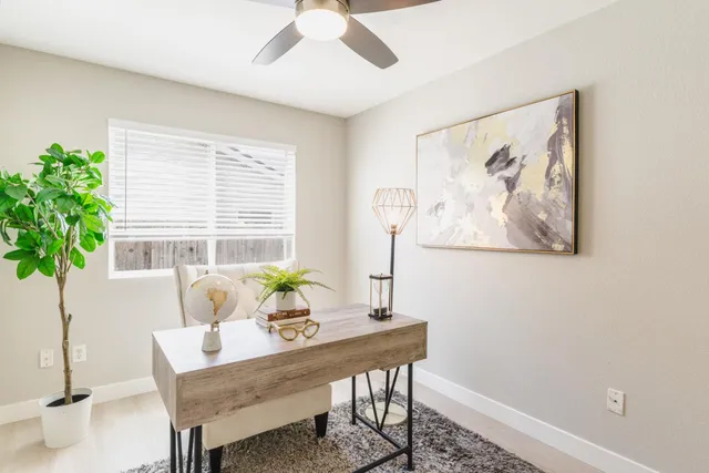 a bedroom with bed and window