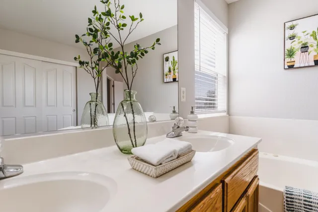 a view of swimming pool with a couches in a patio