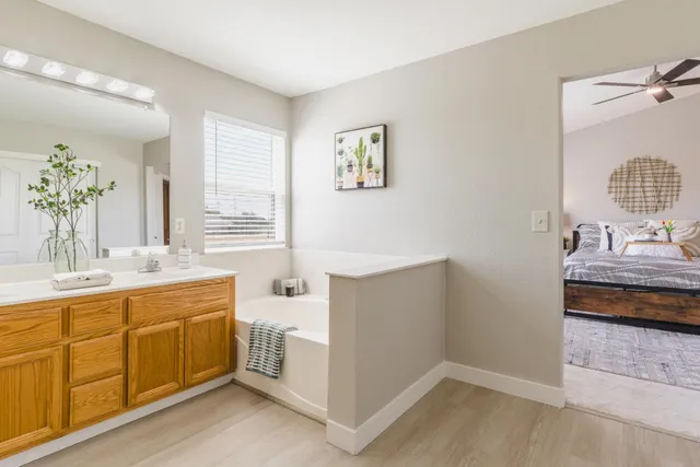 a view of a chairs and fire pit in the patio