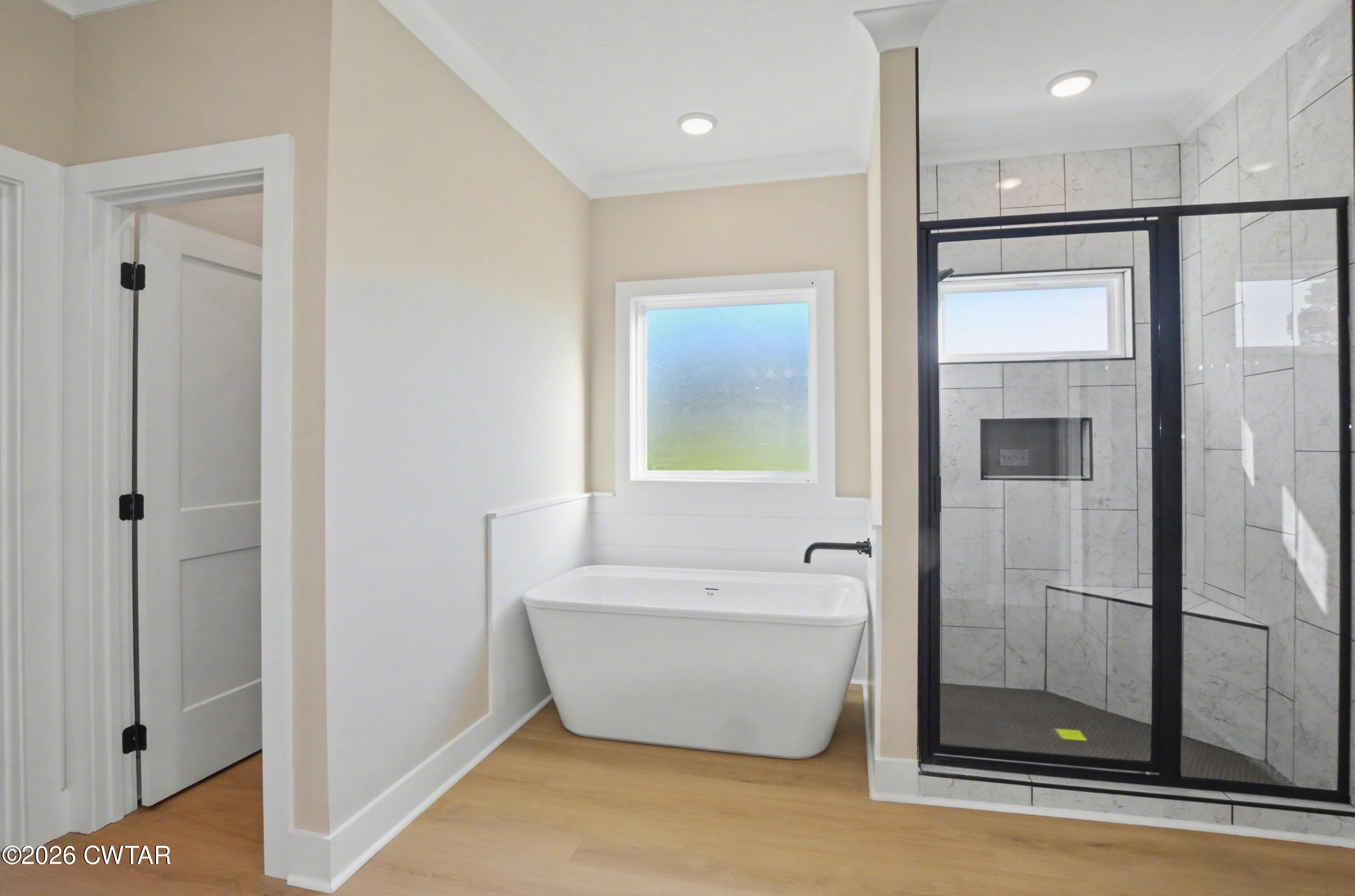 339 Marlow Cemetery Road Gadsden, TN 38337 - Photo 15 of 28 a bathroom with a bathtub and shower