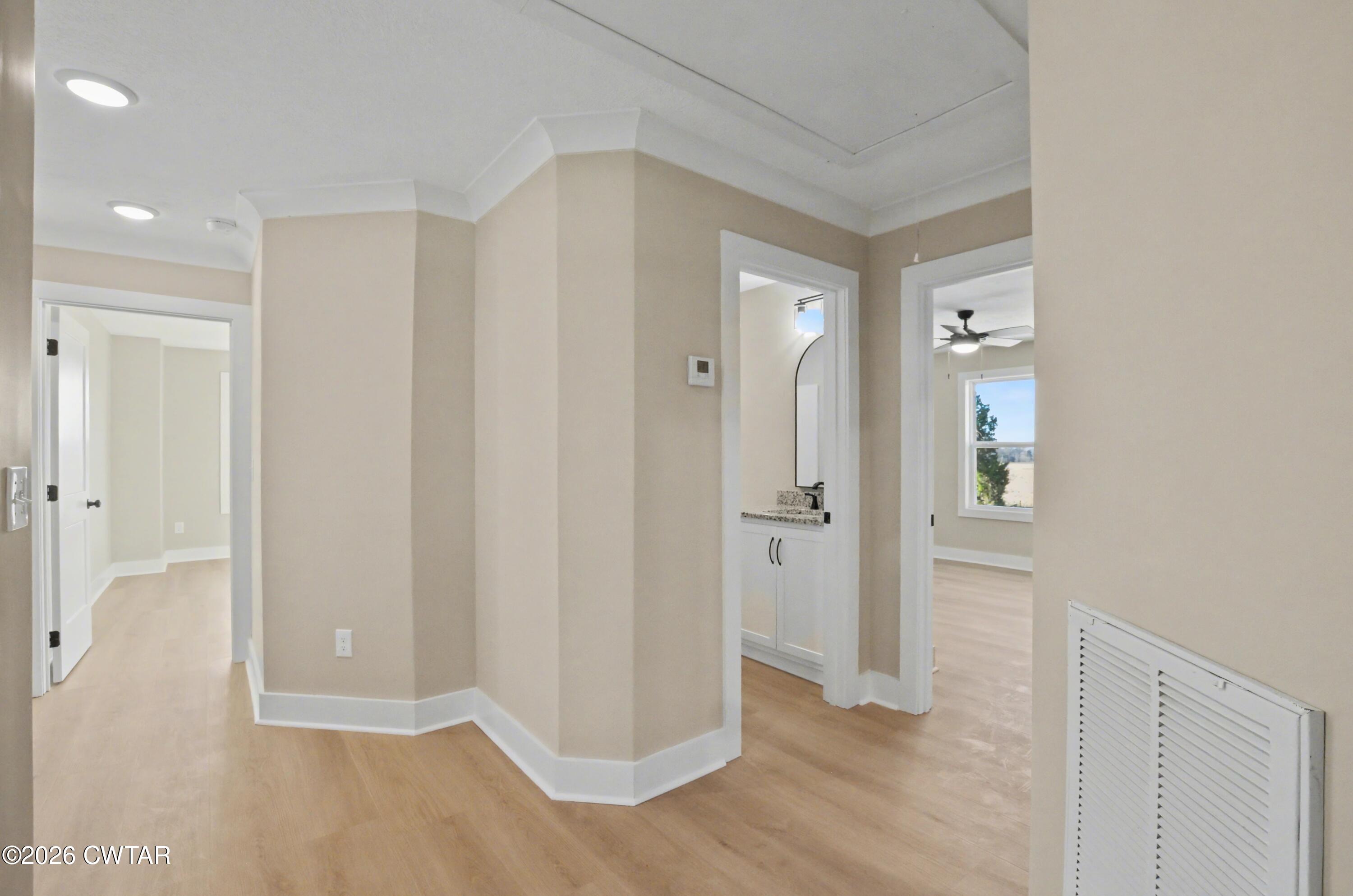 339 Marlow Cemetery Road Gadsden, TN 38337 - Photo 18 of 28 a view of a hallway with wooden floor