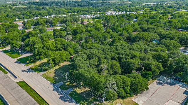 a view of a garden with a building