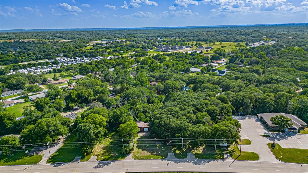 717 Mary Lou Azle, TX 76020 - Photo 16 of 28 an aerial view of residential houses with outdoor space and trees
