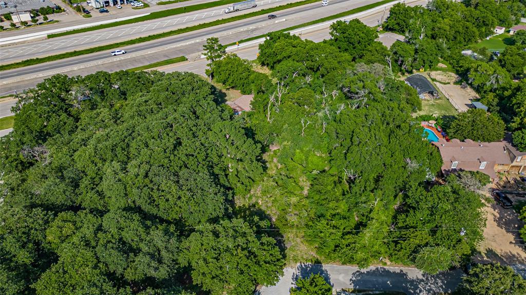 717 Mary Lou Azle, TX 76020 - Photo 17 of 28 a view of a garden with a building
