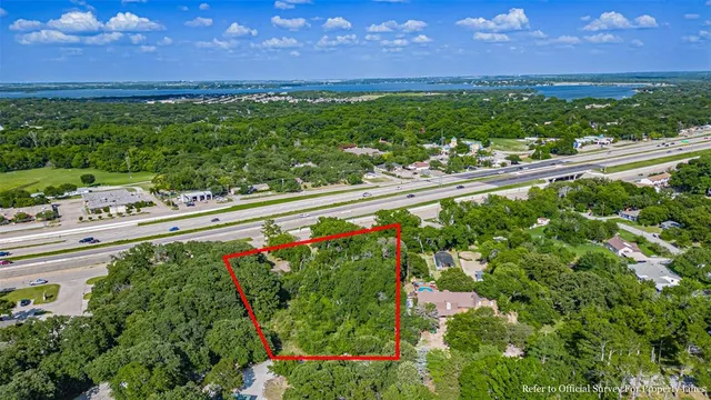 a view of a pathway both side of grassy field